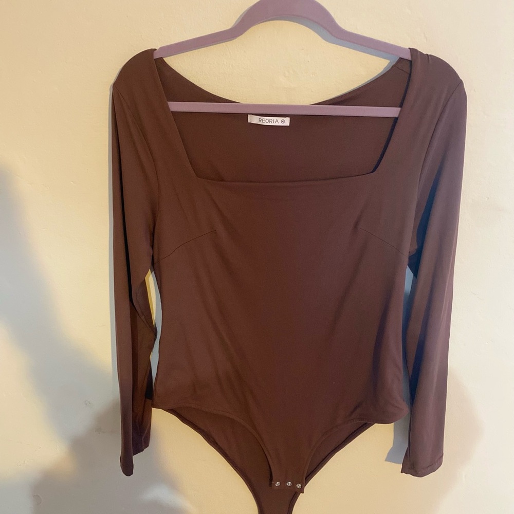 XL, buttersoft material, light brown long sleeve bodysuit, never worn !